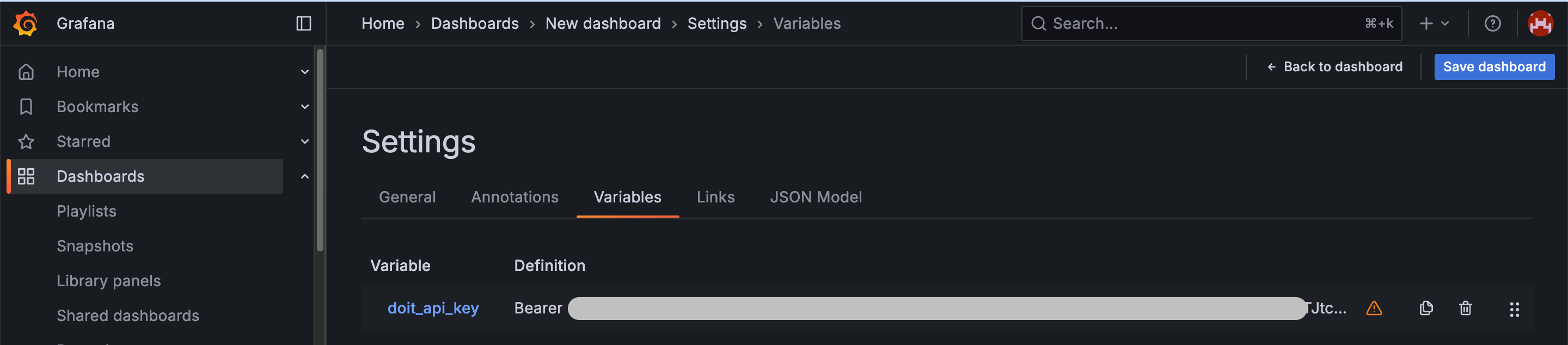 Add the API key as a variable in Grafana